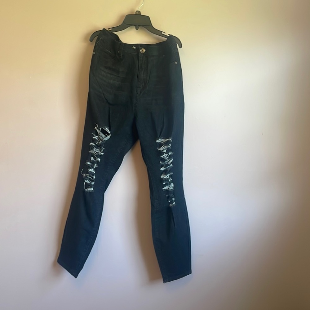 Ripped straight legged jeans